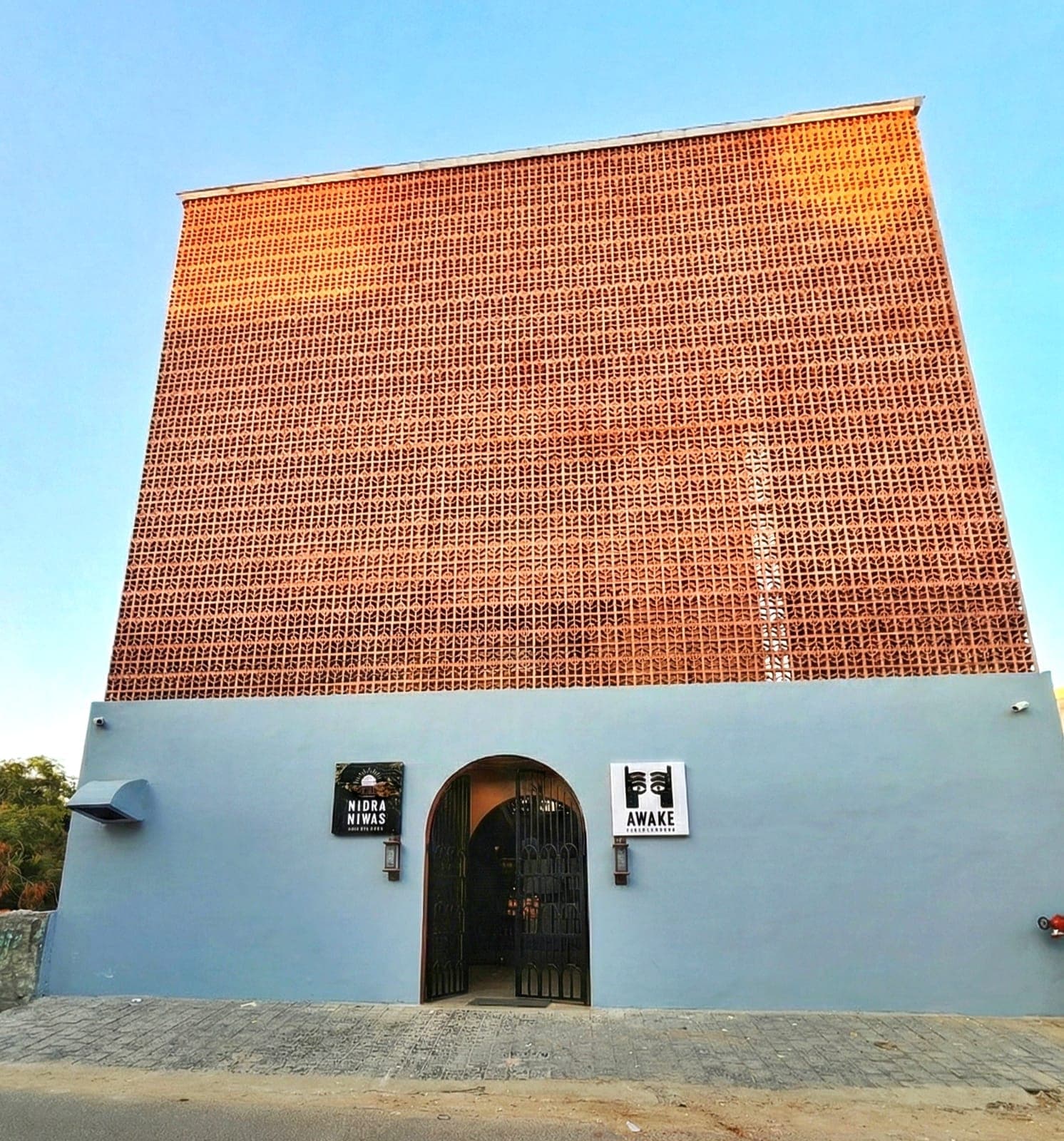 Terracotta jaali facade of Nidra Niwas, a boutique hotel in Jaipur